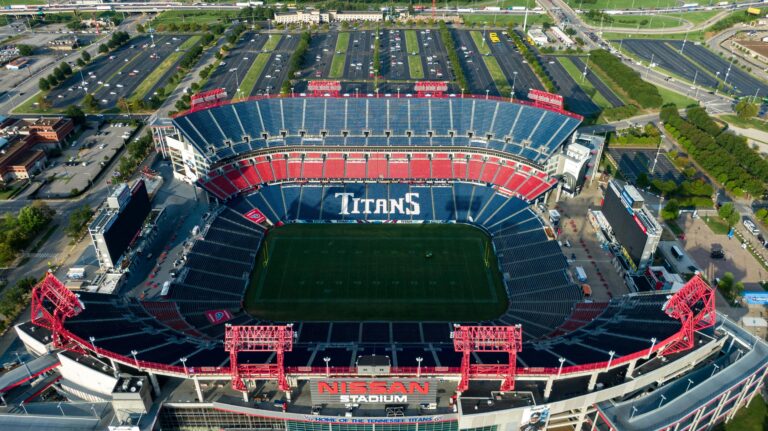 An aerial view of Nissan Stadium, home of the Tennessee Titans, showing the empty seating bowl and the field.